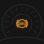 abs warning light on a car dashboard