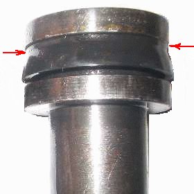 inspecting rubber seals on brake cylinder
