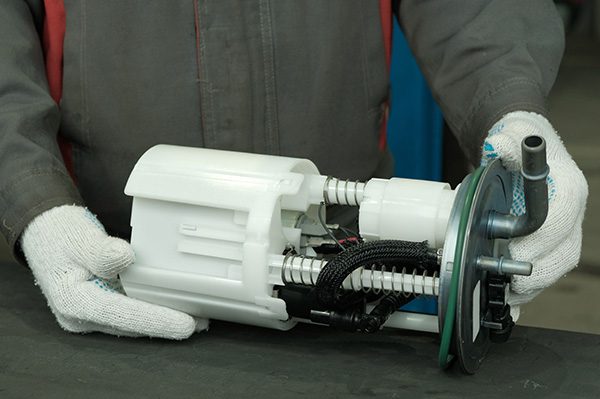 new fuel pump for the car. close up. car maintenance in a car se