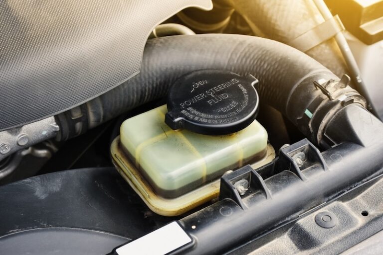 power steering fluid reservoir of the hydraulic steering wheel in the car