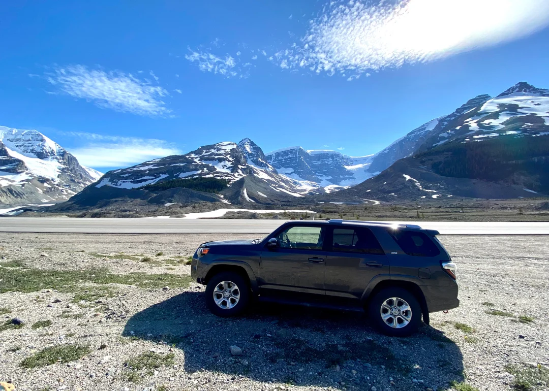a gray toyota 4runner in the mountains.