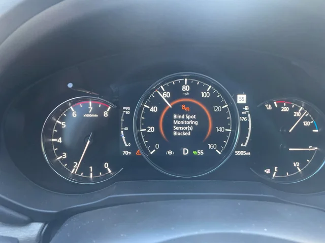 mazda blind spot monitoring sensor blocked